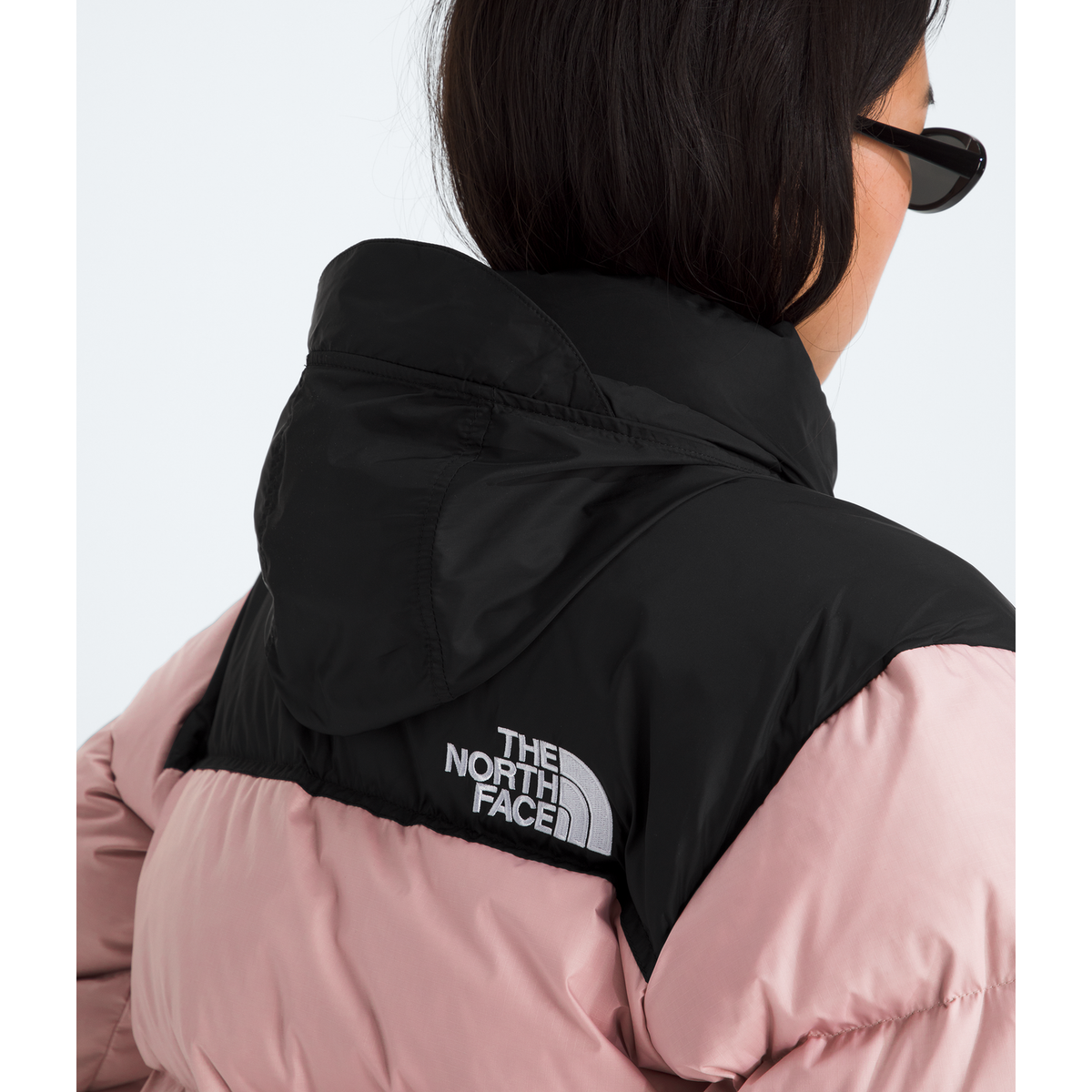 The North Face Women's 1996 Retro Nuptse Jacket in Metal Pink/TNF Black